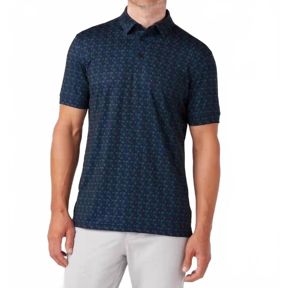 NEW MIZZEN + MAIN versa polo in navy golf swing
